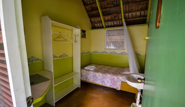 Private bedroom with shared bathroom with breakfast and dinner in Cabarete