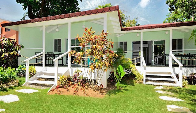 Private bungalow in large tropical garden with pool, steps from shops/beaches! in Sosúa