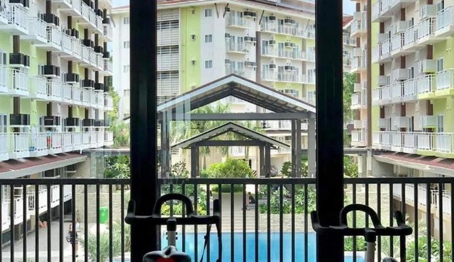 RJ Cozy Stays with pool, gym and free WiFi just 5 mins near Airport in Pusok