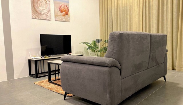 Spacious 3-bedroom neighborhood apartment with AC in Langkawi