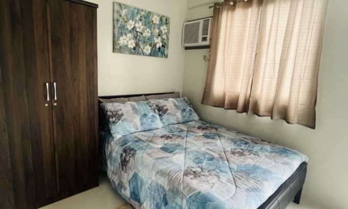 Basak Condo | 1 bedroom condo living room and kitchen sleeps 4 EARLY CHECK IN -LATE CHECK OUT