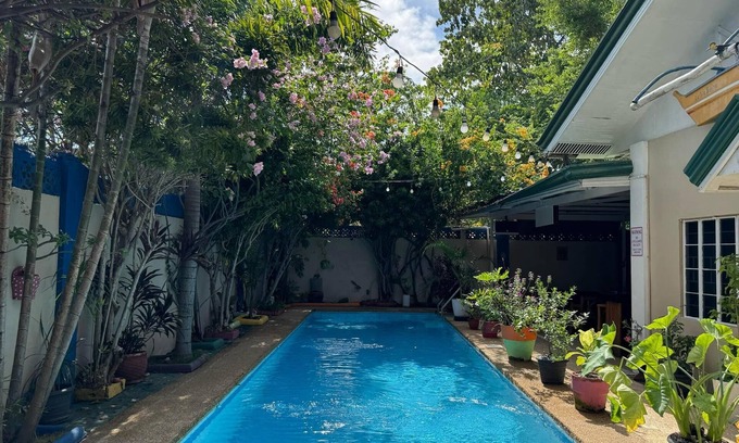 Lapu-Lapu House | 2-bedroom house with 2 bathrooms.Private pool, bar and patio, Free WIFI and AC.
