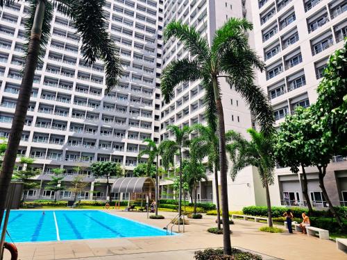 Ususan Apartment | Charm's City Escape at Grace Residences