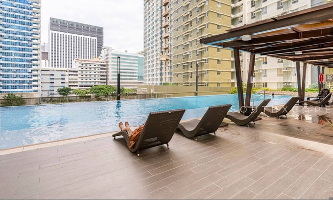 Cebu Apartment | Furnished 1BR | Amenity View, WiFi, Netflix and Pool
