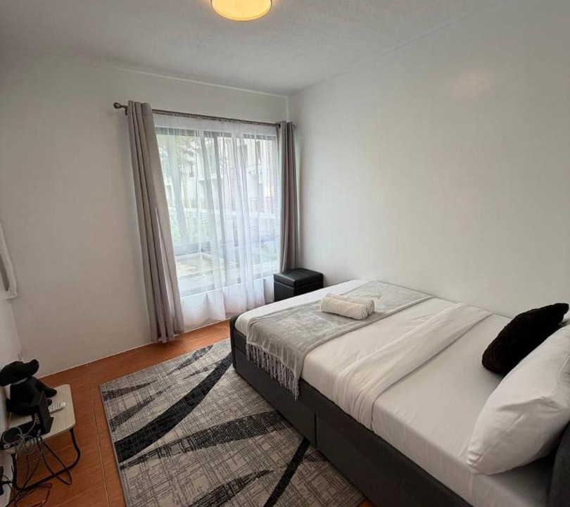 Moonwalk Apartment | Modern lounge 2BR Pool & Netflix Near airport