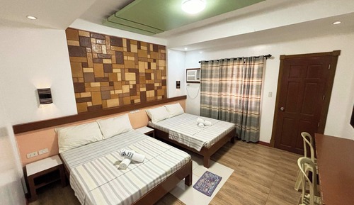 Deluxe Quadruple Room