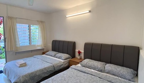 Family Room, 2 Queen Beds, Shared Bathroom