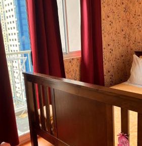 One-Bedroom Apartment with Balcony and City View
