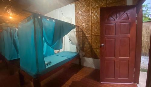 Single Bed in Dormitory Room