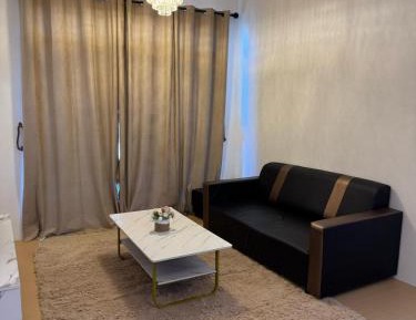 Three-Bedroom Apartment with Balcony