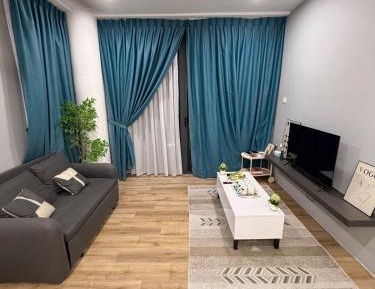 Three-Bedroom Apartment with Balcony