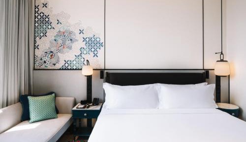 King Room with Sofa Bed and Partial Sea View