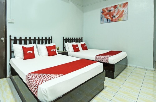 Larut Hotel | Super OYO Capital O 90659 Raintown Timbers Hotel