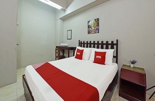 Larut Hotel | Super OYO Capital O 90659 Raintown Timbers Hotel