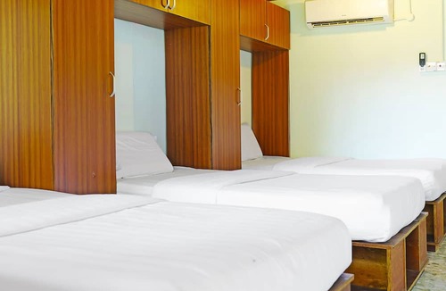 Downtown Kota Kinabalu Hotel | Capital O 90557 Dedsaan Beach Village