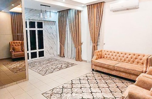 Batu Pahat House | FAMILY Gathering - Sized Corner Lot House with outdoor landscape