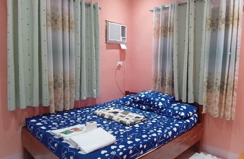Guindulman House | Balai Mariacaria Pension House