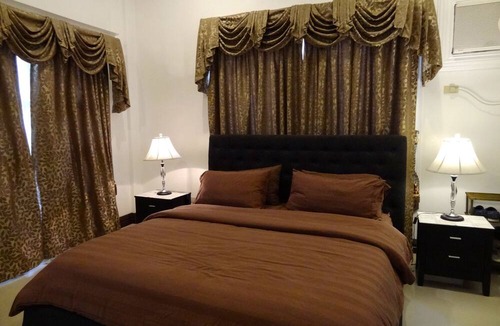 Buhangin Bed & Breakfast | The Executive Villa Inn & Suites