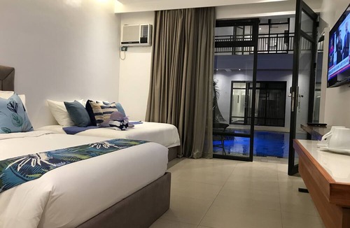 Puerto Princesa City Centre Hotel | White Breeze Palawan Boutique Hotel