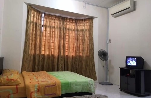 Teluk Kumbar House | Relaxing Seaside Bayan Homestay