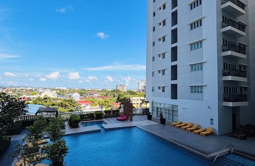 Iloilo Condo | Tranquil Poolside Balcony