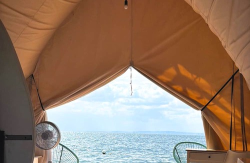Kaputian Boat Rental | Floating Home in Reef Resort Unit 9