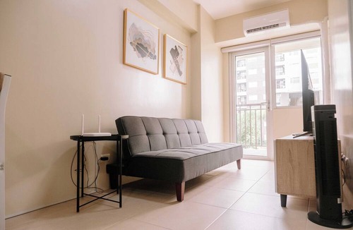 Mandurriao Condo | Pool & Garden Tranquility