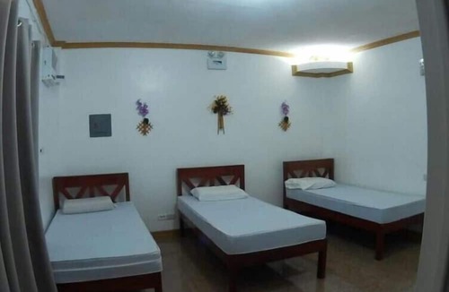 Puerto Princesa City Centre Resort | Hanbee's Flower Garden Resort