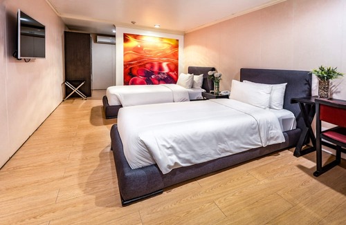 Dasmarinas Village Hotel | Green Sun Hotel