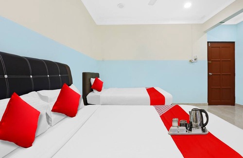 Gua Hotel | OYO 90873 Travellers Inn