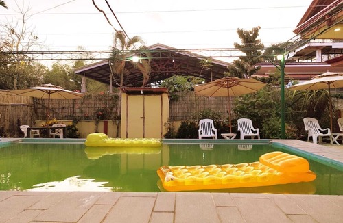 San Pedro House | Amwani Garden Pool & Kubo Tent Rental