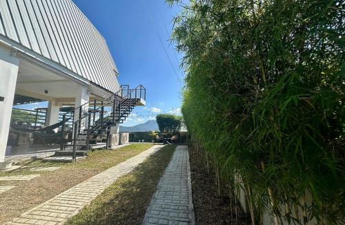 Mataas Na Kahoy House | A-Frame Cabin with Taal Lake View and Hot Tub