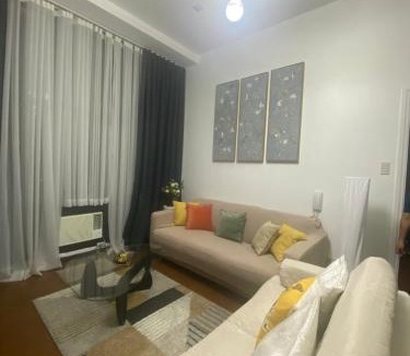 Downtown Apartment | Spacious High Ceiling 2 BR 66th Flr corner unit with Balconies - FREE Sauna Pool Gym View of Skyline Manila Bay-Sunset