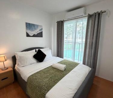 Moonwalk Apartment | Modern lounge 2BR Pool & Netflix Near airport