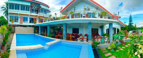 Lemery Hotel | TUBURAN Poolside