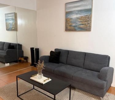 Moonwalk Apartment | Modern lounge 2BR Pool & Netflix Near airport