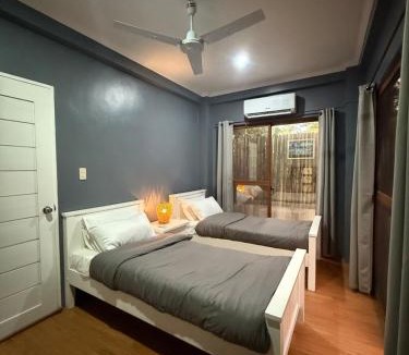 Luzon Apartment | Tropical Palms Siargao Island Life City Comforts