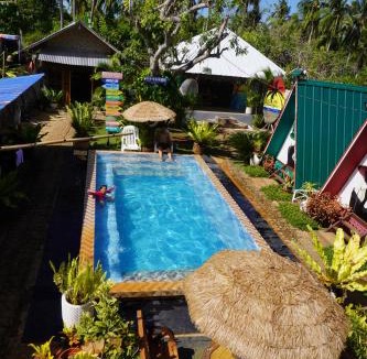 Poro Resort | La Provinzia Exclusive Use - 3 Air-Conditioned Rooms 3 Fan Cooled Huts Good for 12 People