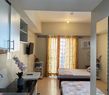 North Reclamation Area Apartment | La Maria Rentals - Stay Across SM City, 2 Double Beds with Wi-Fi