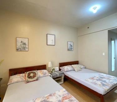 North Reclamation Area Apartment | La Maria Rentals - Stay Across SM City, 2 Double Beds with Wi-Fi