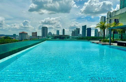 Central District Apartment | Paragon Suites Near CIQ by Stayrene
