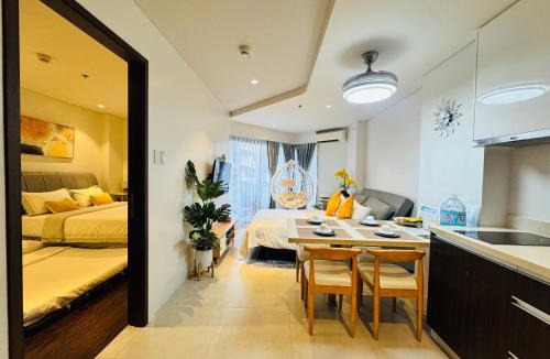 Maribago Apartment | Monaliza 1BR Suite with Balcony & Living Room in Tambuli Seaside Resort