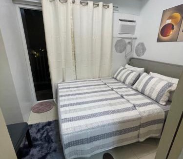 San Dionisio Hostel | Field Residences Pool View with Balcony Near Airport behind SM sucat