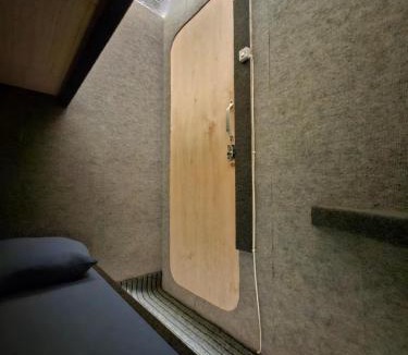 Sampaloc House | Capsule room with aircon