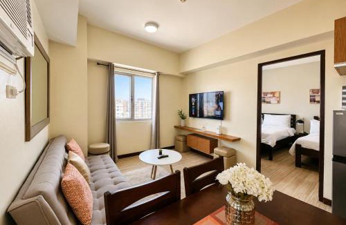 North Reclamation Area Apartment | Family Room - MIGAs Haven at Sunvida Tower