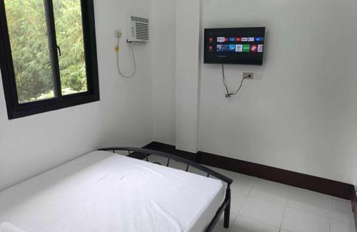 Tigaon Hotel | ljp farm resort couple rooms