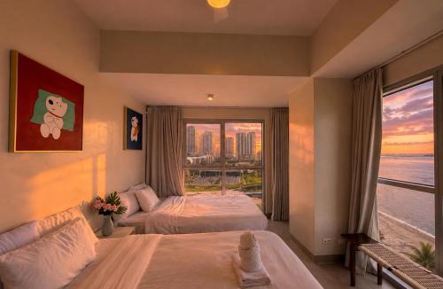Tambo Apartment | Modern Condo next to Okada Manila near MOA and Airport