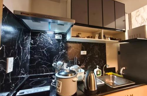 Santo Cristo Hotel | 5-Min Walk Mall SM North EDSA, Near Trinoma , Fast WiFi , Quezon City Manila - The Grass Residences