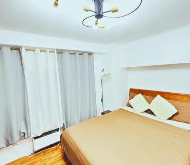Malamig Apartment | Cozy 2 BR 2 Bath Condo with Netflix and Karaoke near MRT EDSA