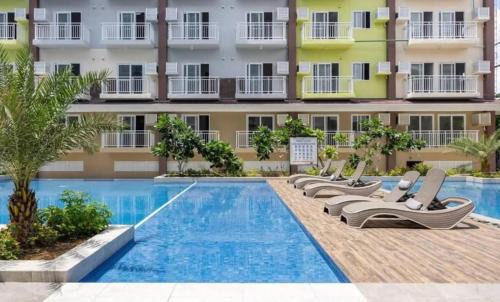 Mactan Export Processing Zone Apartment | Amani Grand Resort Residences Nearest to Airport with FREE POOL & GYM ACCESS